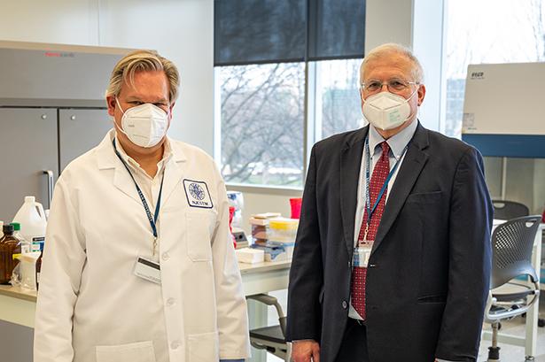Robert Pyatt, Ph.D., and Keith Bostian, Ph.D., in the CLIA Covid lab at Kean University
