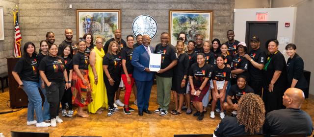 Group photo at Juneteenth Jamboree with proclamation