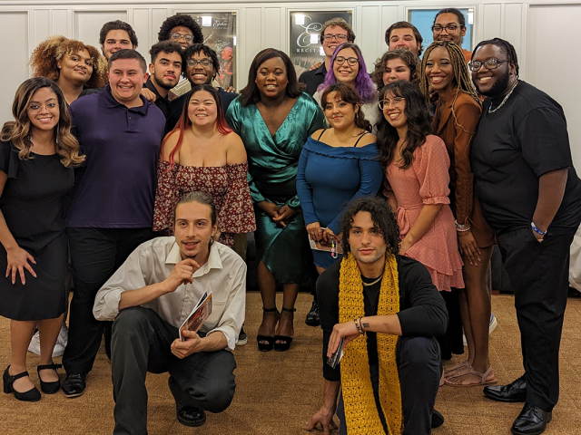 Tony winner Alex Newell poses with Kean students backstage.