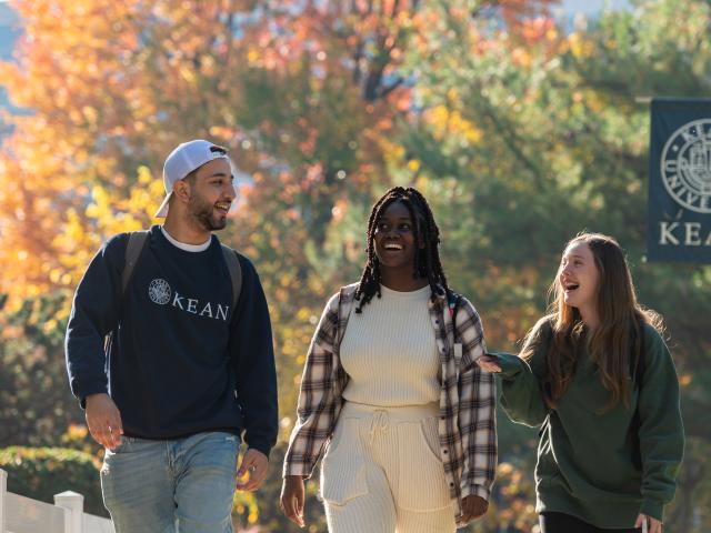 Kean students walk along Cougar Walk in the fall
