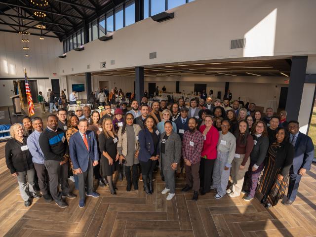 Participants in Building For Growth gather for a group photo