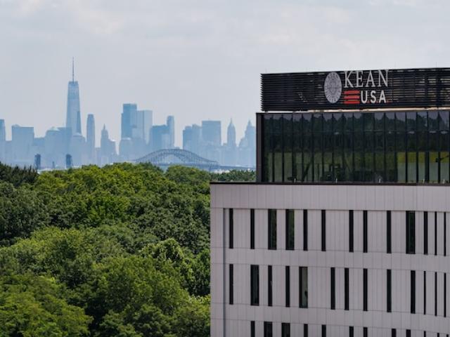 Hynes Hall with a view of the New York City skyline