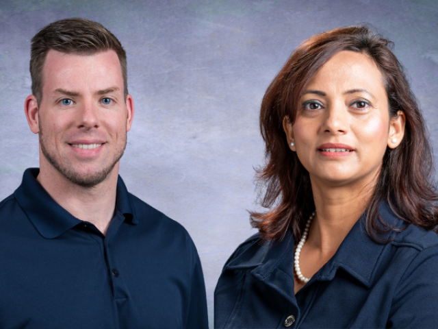 Side-by-side headshots of a smiling white male and an Indian female, both wearing blue; blue-gray background.