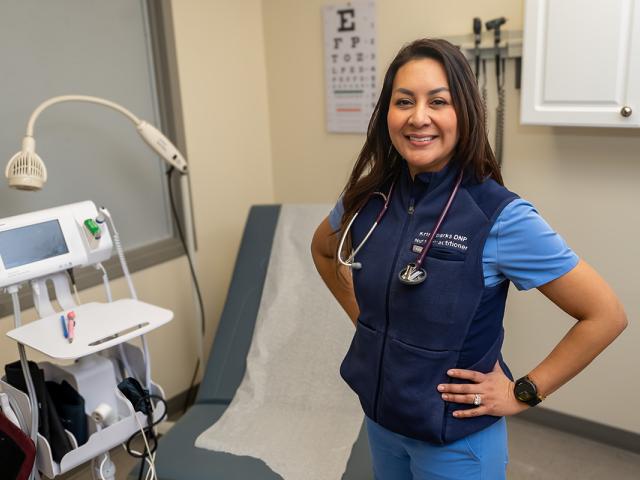 Nurse practitioner Major Kristine Sparks pictured in the exam room at Kean  Wellness Center