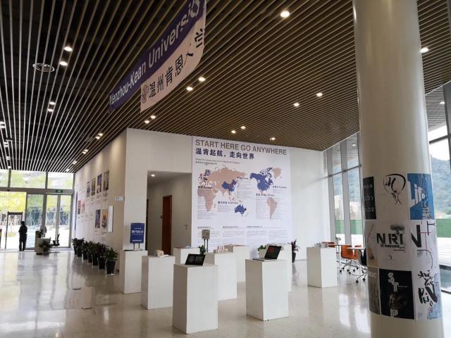 2018 China-US Education Forum in Wenzhou-Kean shows lobby with Wenzhou-Kean banner