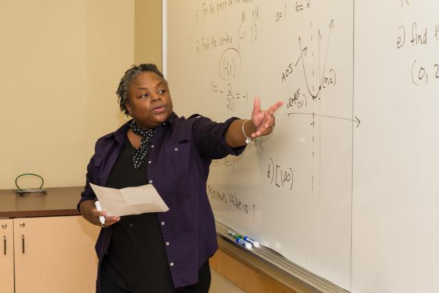 Kean adjunct math professor Irisa Leverette instructs students in algebra.