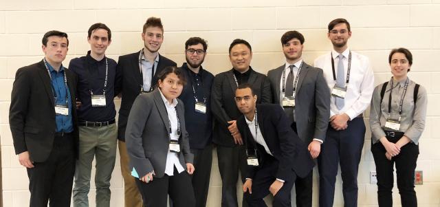 The nine Kean University students who attended the NCUR conference pose together.