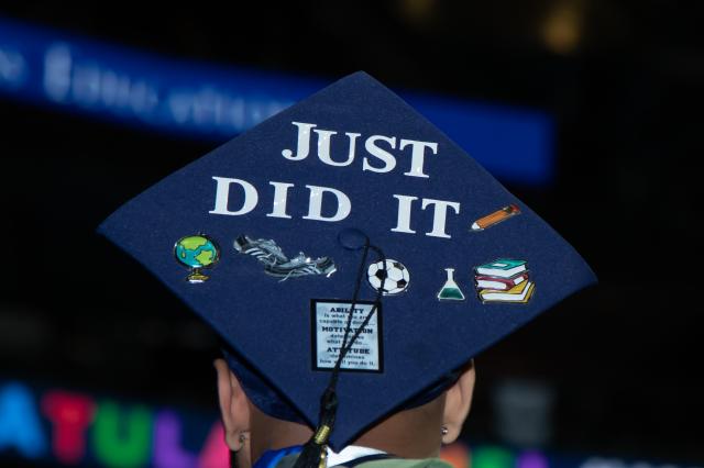 A Kean University commencement cap with the words, "Just did it."