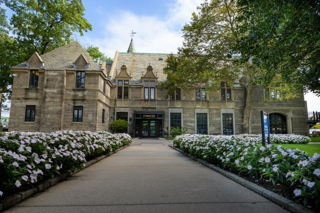 Kean Hall front entrance with flowers