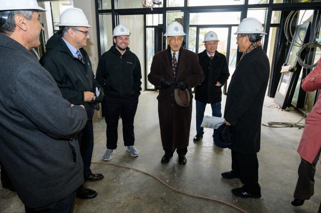 President Dawood Farahi, Ph.D. and others at Hynes Hall Sneak Peak