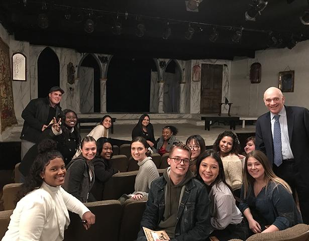 Kean Adjunct English Professor Jeffrey W. Herrmann in a theatre with his Shakespeare Survey class