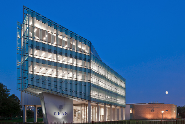 Kean University's STEM building illuminated at night.