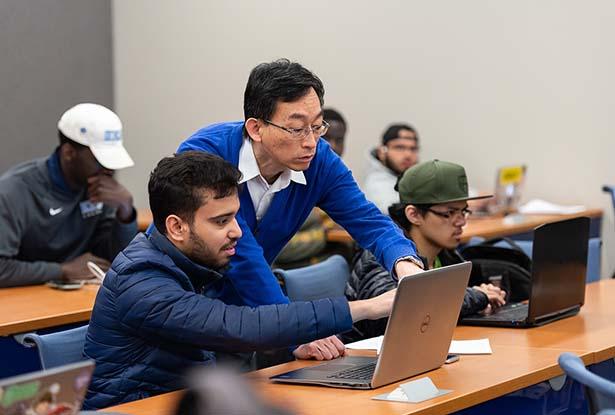 Associate Professor Jing-Chiou Liou teaching a computer science class at Kean University.