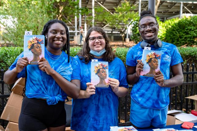 Kean staff display copies of All Boys Aren't Blue, the Common Read book selection.