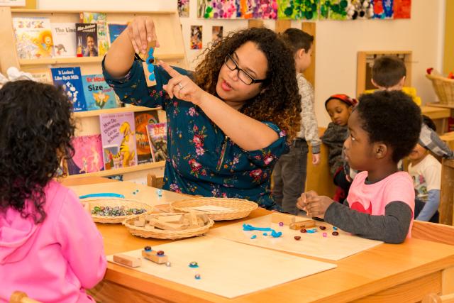 Childcare Center Teacher instructs students