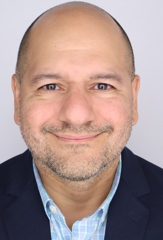 Headshot of Dr. Victor Michael Camacho