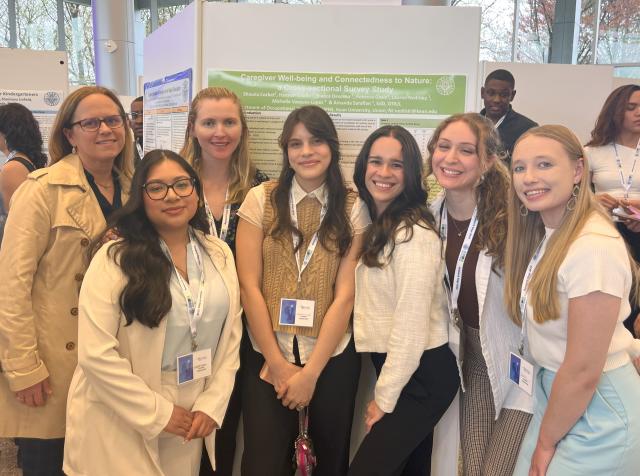 The Nature Nerds next to their research poster at Kean Research Days with Dr. Amanda Sarafian