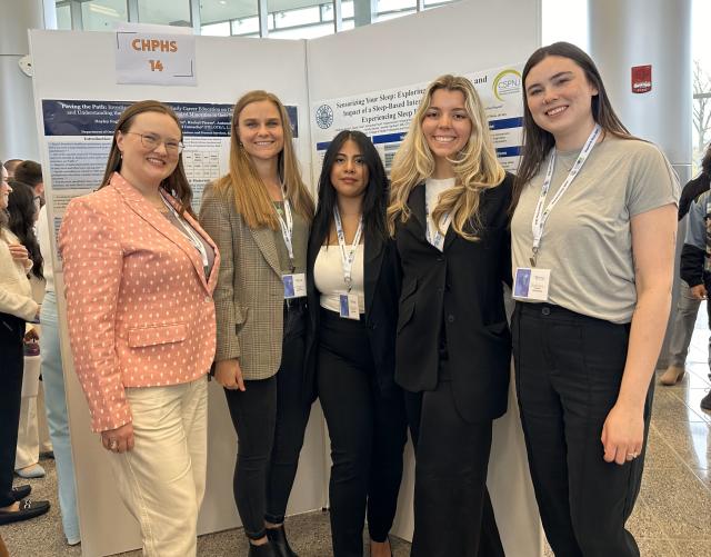 Group photo of the Sleep Masters next to their research poster at Kean Research Days 2024