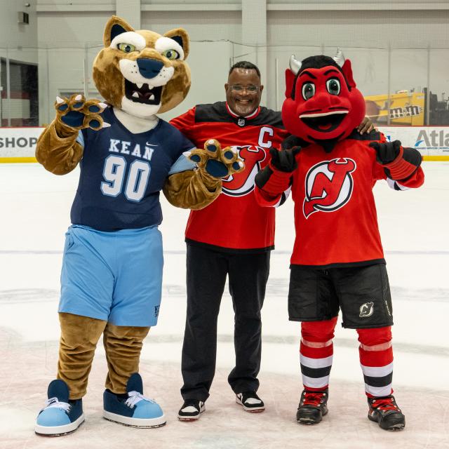 Dr. Repollet and Keanu celebrate Kean's partnership with the New Jersey Devils