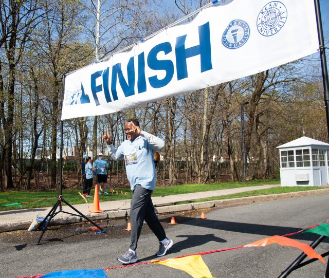 Dr. Repollet completes Kean's Founders Day 5-K.