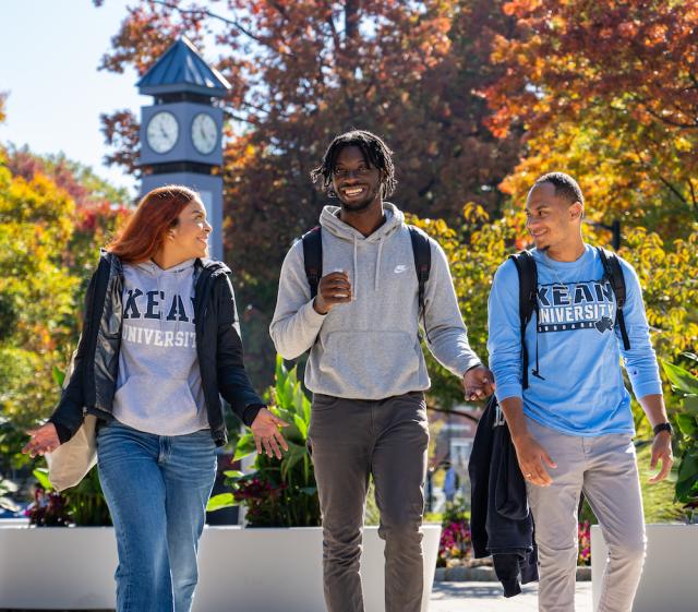 Kean students walk near the clock tower