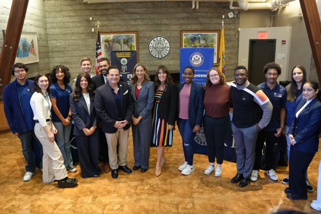 Rep. Sherill, Senators Scutari and Ruiz, and Commissioner Granados pose in Kean Hall with Kean University students.