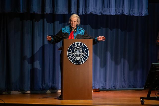 Temple Grandin speaks from podium at Kean