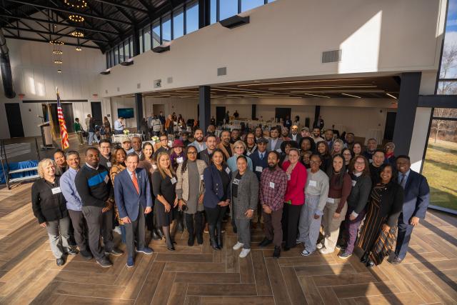 Participants in Building For Growth gather for a group photo